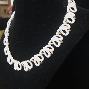 White and gold necklace